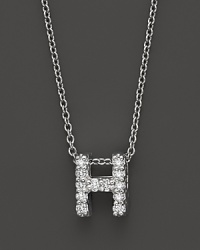 From the Tiny Treasures collection, a diamond H necklace. With signature ruby accent. Designed by Roberto Coin. From the Tiny Treasures collection, a diamond H necklace. With signature ruby accent. Designed by Roberto Coin.