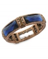 Cutting-edge craftwork. The Montana stretch bracelet from 2028 features ornate tones crafted from copper-tone mixed metal and features wide blue stones for a colorful pop. Approximate length: 7 inches. Approximate height: 1/2 inch.