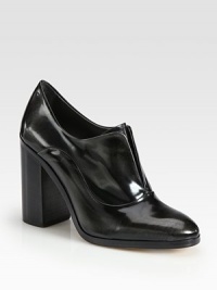 Polished leather oxford rejuvenated by a chunky, stacked heel. Stacked heel, 4 (100mm)Leather upperLeather lining and solePadded insoleMade in ItalyOUR FIT MODEL RECOMMENDS ordering one size up as this style runs small. Polished leather oxford rejuvenated by a chunky, stacked heel. Stacked heel, 4 (100mm)Leather upperLeather lining and solePadded insoleMade in ItalyOUR FIT MODEL RECOMMENDS ordering one size up as this style runs small.