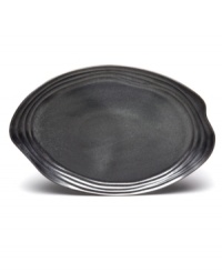 Down-to-earth dining. This Earth serving platter has a handcrafted feel with a fluid shape and steely sheen to complement the Nambe dinnerware collection. Down-to-earth dining. This Earth serving platter has a handcrafted feel with a fluid shape and steely sheen to complement the Nambe dinnerware collection.