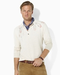 An ultra-soft Henley in lightweight two-layer cotton jersey embodies the spirit of adventure with weathered printed feathers. An ultra-soft Henley in lightweight two-layer cotton jersey embodies the spirit of adventure with weathered printed feathers.