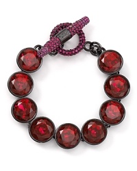 Indulge in glamour on a grand, Juicy Couture scale with this stone-bedecked statement bracelet, toughened up by gunmetal plate. Indulge in glamour on a grand, Juicy Couture scale with this stone-bedecked statement bracelet, toughened up by gunmetal plate.