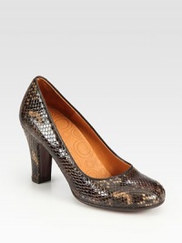 A subtle glaze adds a hint of sheen to this wardrobe staple of snake-embossed leather. Self-covered heel, 3½ (90mm)Snake-embossed leather upperLeather liningLeather sole with rubber insertPadded insoleMade in Spain A subtle glaze adds a hint of sheen to this wardrobe staple of snake-embossed leather. Self-covered heel, 3½ (90mm)Snake-embossed leather upperLeather liningLeather sole with rubber insertPadded insoleMade in Spain