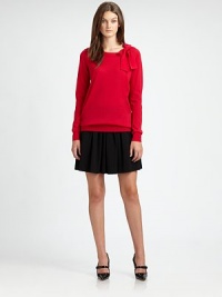 Timelessly luxurious merino wool creates a pristine backdrop for this charming bow-neck sweater.Bow at necklineLong sleevesPulloverRibbed trimAbout 26 from shoulder to hemMerino woolDry cleanImported Model shown is 5'10 (177cm) wearing US size Small. Timelessly luxurious merino wool creates a pristine backdrop for this charming bow-neck sweater.Bow at necklineLong sleevesPulloverRibbed trimAbout 26 from shoulder to hemMerino woolDry cleanImported Model shown is 5'10 (177cm) wearing US size Small.