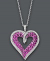 Better than any Valentine, this sparkling heart pendant will really show her you care. Crafted from sterling silver, a cut-out heart features round-cut rubies (2-1/2 ct. t.w.) and diamonds (1/3 ct. t.w.). Approximate length: 18 inches. Approximate drop: 5/8 inch.