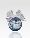 This season, bring Frosty inside with a charming painted glass ornament, complete with a whimsical, snowflake-patterned silver ribbon.12 diam. Imported 
