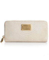 Stay elegantly organized with this posh, python-embossed leather wallet from MICHAEL Michael Kors. The exterior is adorned with an array or chic details, such as gleaming signature hardware and exquisite detail stitching, while card slots, pockets, and zipped compartment offer superb organization within. Stay elegantly organized with this posh, python-embossed leather wallet from MICHAEL Michael Kors. The exterior is adorned with an array or chic details, such as gleaming signature hardware and exquisite detail stitching, while card slots, pockets, and zipped compartment offer superb organization within.