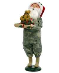 Singing their praises, Santa Claus honors military families in a camouflage suit and iconic red hat. In his arms are extra-special gifts piled high and topped with an adorable stuffed bear. An all-American figurine, handcrafted by Byers' Choice. Singing their praises, Santa Claus honors military families in a camouflage suit and iconic red hat. In his arms are extra-special gifts piled high and topped with an adorable stuffed bear. An all-American figurine, handcrafted by Byers' Choice.