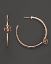 Di MODOLO's sleek and modern earrings show off the brand's signature shape on a smooth, clean hoop.