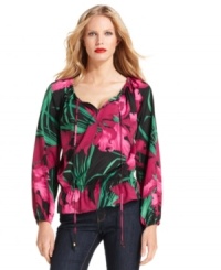 MICHAEL Michael Kors adorned this peasant top with an exotic floral print for a vibrant effect. MICHAEL Michael Kors adorned this peasant top with an exotic floral print for a vibrant effect.