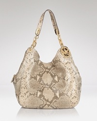 Clean and simply detailed, this versatile MICHAEL Michael Kors carryall will make a timeless addition to your accessory repertoire. Carry it for effortless style on-duty or off. Clean and simply detailed, this versatile MICHAEL Michael Kors carryall will make a timeless addition to your accessory repertoire. Carry it for effortless style on-duty or off.