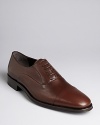 Fine, lace up loafers with stitched detail across the front cap, rounded toe. Italian leather heel with slight heel.