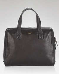 In butter-soft leather and a structured shape, this satchel from Olivia Harris means business. In butter-soft leather and a structured shape, this satchel from Olivia Harris means business.