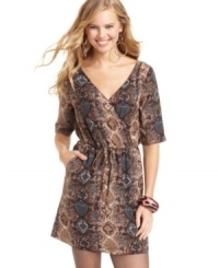 Fierce for sure! Covered in animal-print and designed with a cool back cutout, Mimi Chica's short sleeve dress works perfectly for day or night. Fierce for sure! Covered in animal-print and designed with a cool back cutout, Mimi Chica's short sleeve dress works perfectly for day or night.