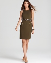 Master utilitarian chic in this belted MICHAEL Michael Kors sheath dress, finished with front zips for modern edge. Amp up the sleek silhouette with nude heels. Master utilitarian chic in this belted MICHAEL Michael Kors sheath dress, finished with front zips for modern edge. Amp up the sleek silhouette with nude heels.