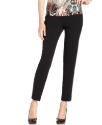 Calvin Klein's pants are slim, sophisticated and streamlined with a side zipper and pocket-free styling.