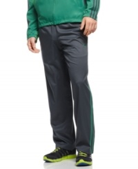 Stay on top. Keep your performance at its peak in these adidas wind pants with ClimaProof technology. Stay on top. Keep your performance at its peak in these adidas wind pants with ClimaProof technology.