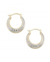An intricate Greek Key design makes these 14k two-tone gold hoop earrings eye-catching.