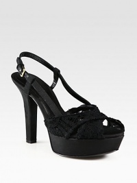 Feminine platform slingback of delicate, semi-sheer lace mixed with grosgrain ribbon. Ribbon-covered heel, 4¾ (120mm)Ribbon-covered platform, 1¼ (30mm)Compares to a 3½ heel (90mm)Lace and grosgrain ribbon upperAdjustable grosgrain ribbon and leather slingback strapLeather lining and solePadded insoleMade in Italy