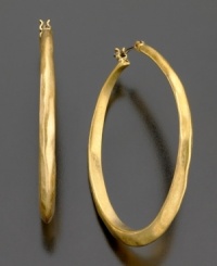 Kenneth Cole New York gets it right with these trendy hoop earrings crafted in goldtone mixed metal. Approximate diameter: 1-1/2 inches.