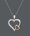 Double up on the love. Necklace features two open-cut hearts - one in sterling silver and an overlapping heart in 18k rose gold over sterling silver. Surface features a light dusting of round-cut diamond accents. Approximate length: 18 inches. Approximate drop: 1 inch.