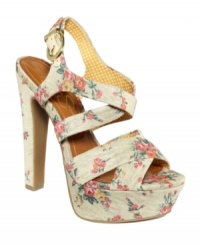 Pretty and femme. Jessica Simpson's Poll platform sandals feature an all-over floral print that will make you feel so amazingly beautiful. Pretty and femme. Jessica Simpson's Poll platform sandals feature an all-over floral print that will make you feel so amazingly beautiful.