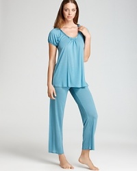To sleep or to lounge, this versatile cap-sleeve T-shirt and knit pants from Midnight by Carole Hochman are silky soft. To sleep or to lounge, this versatile cap-sleeve T-shirt and knit pants from Midnight by Carole Hochman are silky soft.