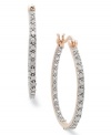 An elegant addition. These hoop earrings from Victoria Townsend are crafted in 18k gold over sterling silver, with diamonds (1/4 ct. t.w.) adding a lustrous effect. Approximate diameter: 1-1/8 inches.