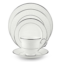 With enameled pearl-like dots, an opalescent background, and the innocence of bone china, Opal Innocence is a romantic pattern of understated elegance. Two bands of platinum a slightly wider one on the rim, kissing a thin fluted design, and a narrower one inside the border adorn each plate. The cup bears additional platinum on its graceful handle and another band at midpoint. Each piece is decorated with a flowing, white-on-white vine design peppered with enamel dots. This service creates a splendid formal table setting and, because of its neutral coloring, works well with any table décor. With enameled pearl-like dots, an opalescent background, and the innocence of bone china, Opal Innocence is a romantic pattern of understated elegance. Two bands of platinum a slightly wider one on the rim, kissing a thin fluted design, and a narrower one inside the border adorn each plate. The cup bears additional platinum on its graceful handle and another band at midpoint. Each piece is decorated with a flowing, white-on-white vine design peppered with enamel dots. This service creates a splendid formal table setting and, because of its neutral coloring, works well with any table décor.