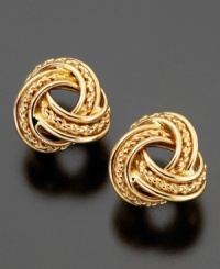 Lustrous love knots are crafted from ropes of 14k gold on these gleaming stud earrings. Lustrous love knots are crafted from ropes of 14k gold on these gleaming stud earrings.