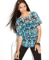 A bold print on a blouson-style silhouette makes this petite INC top totally on-trend for the season. Pair with skinny black pants and heels for a night-out look that says wow! A bold print on a blouson-style silhouette makes this petite INC top totally on-trend for the season. Pair with skinny black pants and heels for a night-out look that says wow!