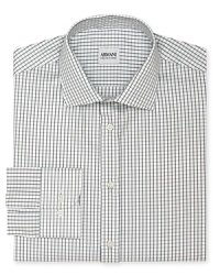 This refreshing tonal take on a classic windowpane check shirt offers a contemporary fit in superior Italian cotton for a truly refined masterpiece from Armani Collezioni. This refreshing tonal take on a classic windowpane check shirt offers a contemporary fit in superior Italian cotton for a truly refined masterpiece from Armani Collezioni.