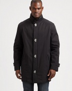 The classic car coat cut from rich tech wool and finished with distinctive gancini closures.Stand collarFront gancini closureSlash pocketsAbout 35 from shoulder to hemWoolDry cleanMade in Italy