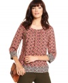 With contrast prints, this RACHEL Rachel Roy blouse is perfect for adding a pop of pattern to your fall look!