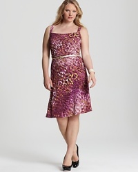 Wake up your working wardrobe with this Jones New York Collection Plus dress. A vibrant prints emblazons a fit-and-flare silhouette for strong femininity. Wake up your working wardrobe with this Jones New York Collection Plus dress. A vibrant prints emblazons a fit-and-flare silhouette for strong femininity.