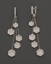 Cascading hexagon's glamorously frame the face in India Hicks' sterling silver and diamond drop earrings.