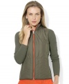 Lauren Ralph Lauren's chic quilted vest is crafted in sleek microfiber and reverses between two bold colored sides for easy athletic styling options. (Clearance)