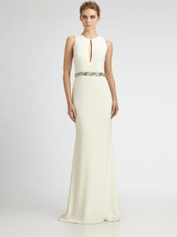 Sleek and impeccably tailored, this sweeping design is accented with an alluring front keyhole and a beaded waistband.Jewel necklineSleevelessFront keyholeBeaded waistbandBack trainConcealed back zipFully linedAbout 46 from natural waistPolyester/spandexSpot cleanImportedModel shown is 5'10 (177cm) wearing US size 4. Sleek and impeccably tailored, this sweeping design is accented with an alluring front keyhole and a beaded waistband.Jewel necklineSleevelessFront keyholeBeaded waistbandBack trainConcealed back zipFully linedAbout 46 from natural waistPolyester/spandexSpot cleanImportedModel shown is 5'10 (177cm) wearing US size 4.
