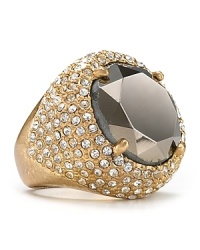 A shimmering stone rises from a tony gold plated setting on this showstopping cocktail ring from ABS by Allen Schwartz ring, completed by an adjustable band. A shimmering stone rises from a tony gold plated setting on this showstopping cocktail ring from ABS by Allen Schwartz ring, completed by an adjustable band.