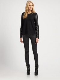 Buttery leather sleeves add unmistakable style to this crewneck wool top.CrewneckLong sleevesExposed back zipperBack yokeAbout 24 from shoulder to hemBody: woolSleeves: lambskin leatherDry clean by leather specialistImportedSIZE & FIT Model shown is 5'10½ (179cm) wearing a US size Small. Buttery leather sleeves add unmistakable style to this crewneck wool top.CrewneckLong sleevesExposed back zipperBack yokeAbout 24 from shoulder to hemBody: woolSleeves: lambskin leatherDry clean by leather specialistImportedSIZE & FIT Model shown is 5'10½ (179cm) wearing a US size Small.