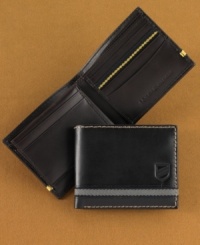 With sophisticated, classic styling, this Tommy Hilfiger passcase wallet subtly punctuates your look. With sophisticated, classic styling, this Tommy Hilfiger passcase wallet subtly punctuates your look.