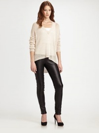 Oversized, semi-sheer knit with a plunging v-neck, framed by dropped shoulders, dolman sleeves and a ribbed, hi-low hem. V-neckDropped shouldersLong dolman sleevesRibbed cuffs and hemHi-low hemLinenDry cleanImported of Italian fabricModel shown is 5'10 (177cm) wearing US size Small. Oversized, semi-sheer knit with a plunging v-neck, framed by dropped shoulders, dolman sleeves and a ribbed, hi-low hem. V-neckDropped shouldersLong dolman sleevesRibbed cuffs and hemHi-low hemLinenDry cleanImported of Italian fabricModel shown is 5'10 (177cm) wearing US size Small.