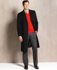 Women have known this for years: That black makes everything look slimmer and somehow more elegant. Here, Calvin Klein demonstrates that the truism applies to menswear too, tailoring a wool/cashmere topcoat with a particularly long, lean line. Women have known this for years: That black makes everything look slimmer and somehow more elegant. Here, Calvin Klein demonstrates that the truism applies to menswear too, tailoring a wool/cashmere topcoat with a particularly long, lean line.