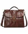 Give in to your animal instincts with this croc-embossed leather bag from Fossil, featuring brass-tone hardware and signature detailing. Convenient crossbody strap keeps hands free for easy access to pockets and compartments within.