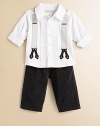 An ultra-handsome ensemble for your little man features a grown-up, button-front dress shirt and coordinating velveteen pants with attached suspenders. Shirt Shirt collarShort cuffed sleevesButton-frontPleated bodice Pants Attached suspendersElastic waistbandAngled front pocketsCottonMachine washImported Please note: Number of buttons may vary depending on size ordered. 