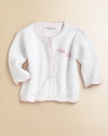 The pretty princess and her towering castle are sweetly embroidered on the front of a cozy pima cotton cardigan with pointelle stitched trim.Round neckline with contrast crocheted edging Long sleeves and hem with scalloped crocheted trim and pointelle stitching Button front Cotton Machine wash Imported Please note: Number of buttons may vary with size ordered. 