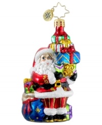 Santa Claus is ready to kick-start Christmas this season with a bunch of brilliantly colored gifts in this hand-painted glass ornament from Christopher Radko. Santa Claus is ready to kick-start Christmas this season with a bunch of brilliantly colored gifts in this hand-painted glass ornament from Christopher Radko.