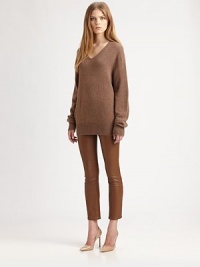 Luxurious, ultra-soft cashmere, knit in a cozy, oversized silhouette.V necklineLong sleevesRib-knit cuffs and hemCashmereDry cleanMade in USA of Italian fabricModel shown is 5'10 (177cm) wearing US size Small. Luxurious, ultra-soft cashmere, knit in a cozy, oversized silhouette.V necklineLong sleevesRib-knit cuffs and hemCashmereDry cleanMade in USA of Italian fabricModel shown is 5'10 (177cm) wearing US size Small.