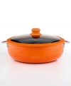 A little color, a lot of great taste. A jolt of orange wakes up your space and ushers in a new cooking sensibility. This aluminum vessel prompts quick & even heating, while the handy glass lid locks in flavor, nutrients and moisture. The nonstick interior & silicone rim add a hearty helping of ease & convenience.