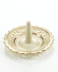 Distinguished by a scalloped edge, bands of gold and heart cutouts in creamy ivory porcelain, this lovely ring holder combines traditional style and timeless grace. Distinguished by a scalloped edge, bands of gold and heart cutouts in creamy ivory porcelain, this lovely ring holder combines traditional style and timeless grace.